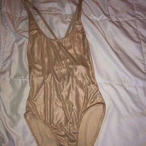 Sheer gold bodysuit from Charlotte Russe